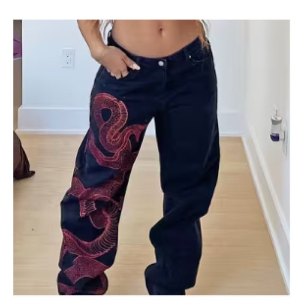 Black Jeans with Red Snake Design